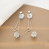Extended Star-Shaped Tassel Earrings - Image 2